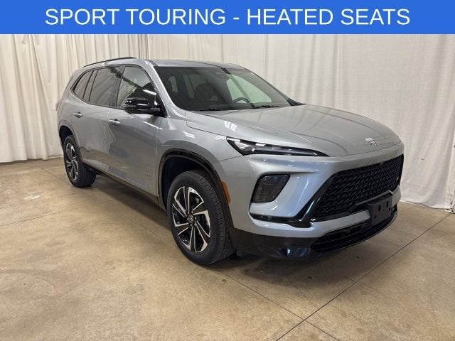 2025 Buick Enclave Sport Touring in Moonstone Gray Metallic — front three-quarter view