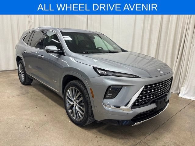 2025 Buick Enclave Avenir in Moonstone Gray Metallic — front three-quarter view